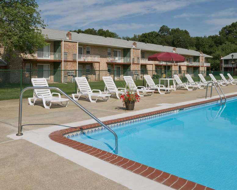 swimming pool with chairs at Maple Shade, NJ apartments